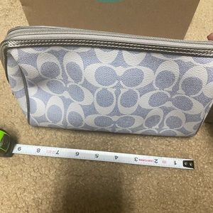 Blue Coach makeup bag
